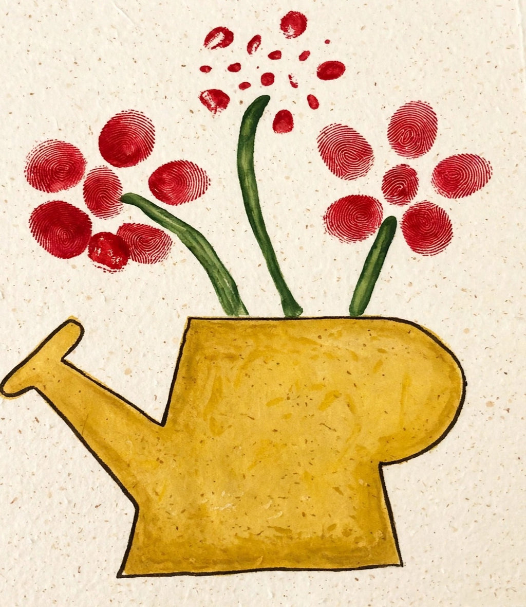 Watering can with fingerprint flowers artwork